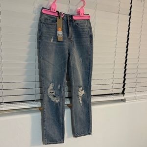 Mid rise, slim leg, ankle grazing womens jeans